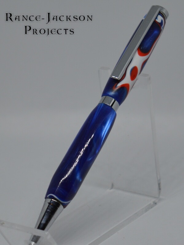 Red, white, and blue ball point pen