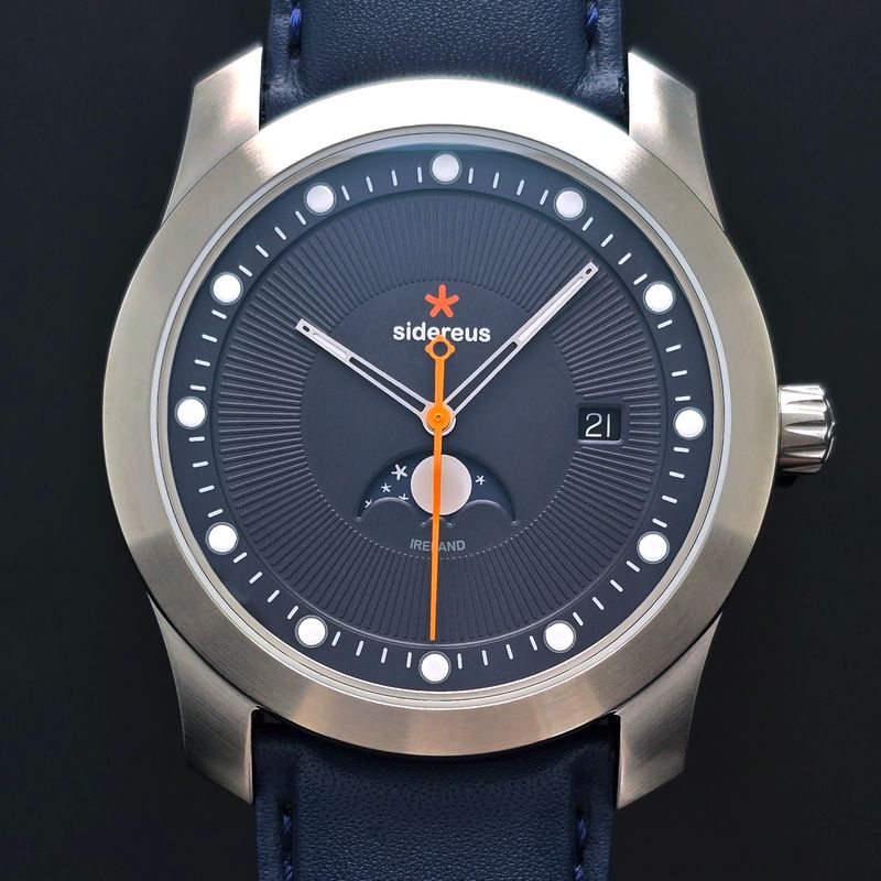 Newgrange Moon Phase with a Brushed Finish and a Zenith Blue Dial 25/50 Newgrange Moon Phase with a Brushed Finish and a Zenith Blue Dial 25/50