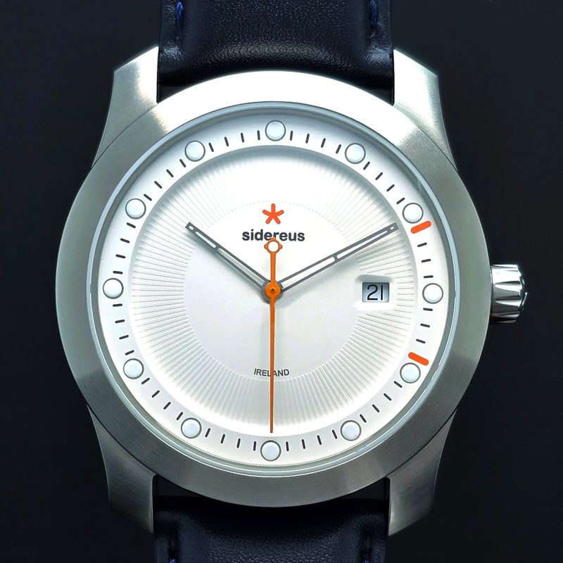 Newgrange Date/Time with a Brushed Finish and a Quartzite White Dial 50/50 Newgrange Date/Time with a Brushed Finish and a Quartzite White Dial 50/50