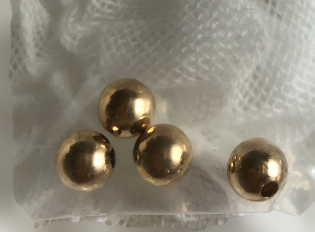 6 mm Rund glat guld double perle. 4 stk. pr pose