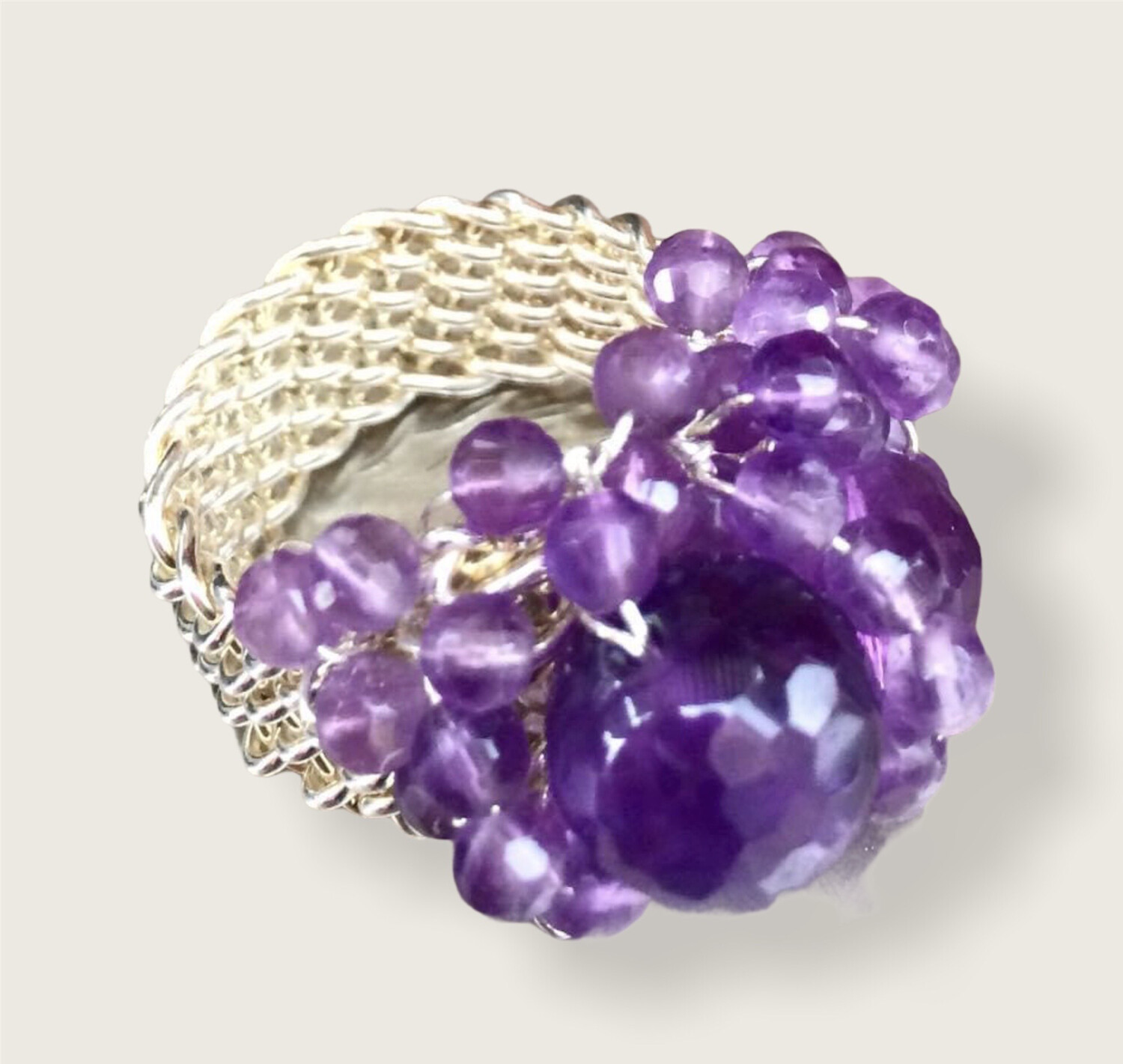 Håndflettet fingerring I Sterlingsølv. Med ametyst