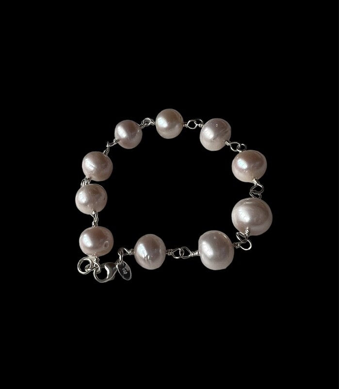 Unika armbånd. Store let Rosa Ferskvandsperler