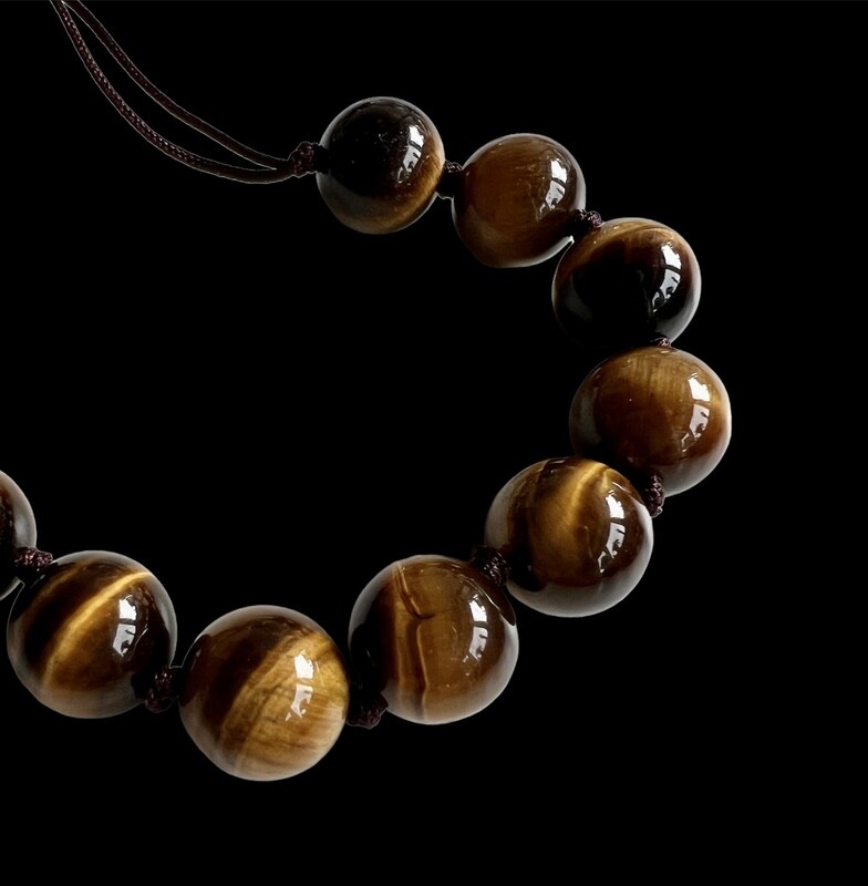 Tigerøje 10 mm glatte sten. Armbånd fra