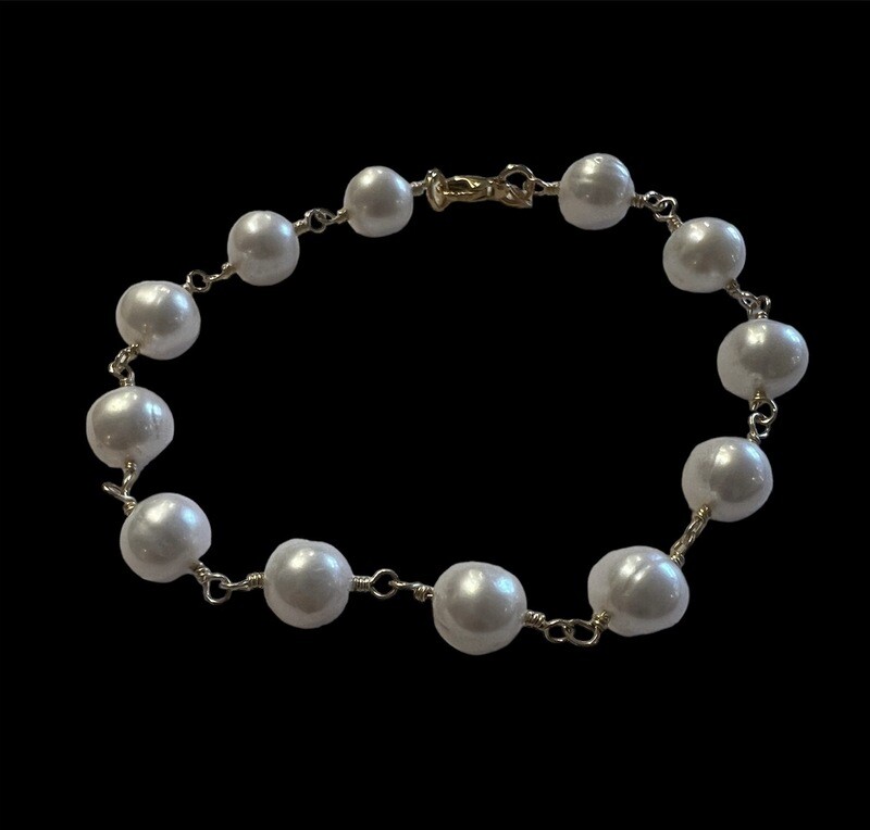 Unika armbånd. Hvide ferskvandsperler 14 karat guld 585