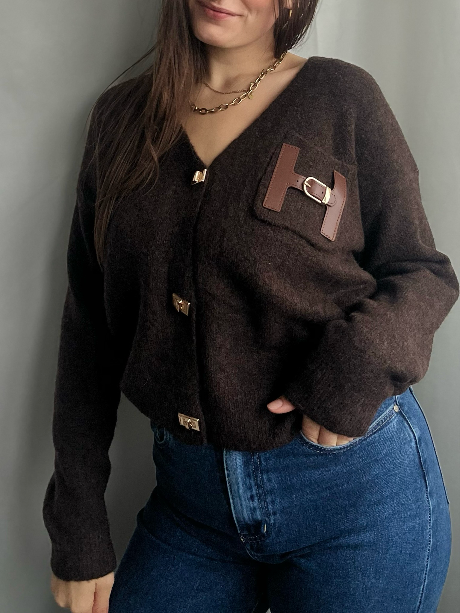 Vest met gouden details