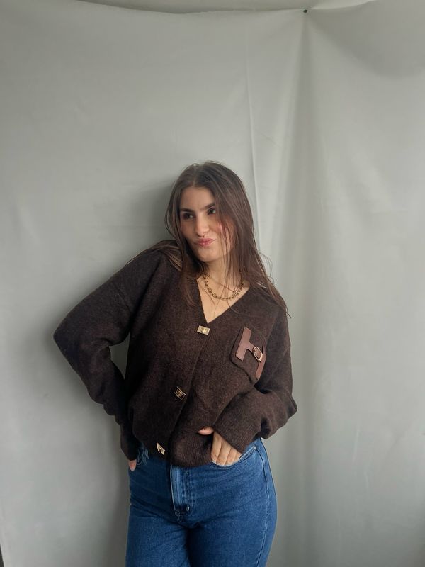 Bruine vest met gouden details