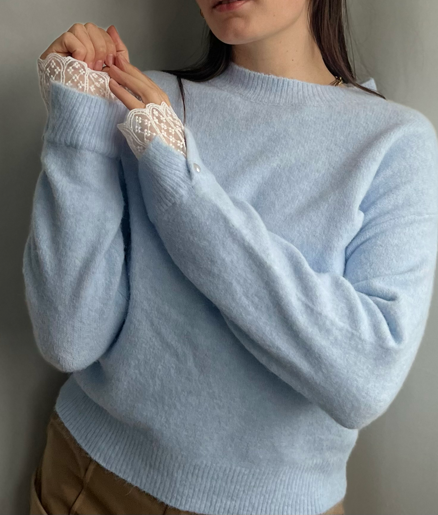 Trui met kanten mouwen
