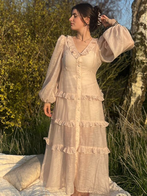 Lange doorschijnende jurk