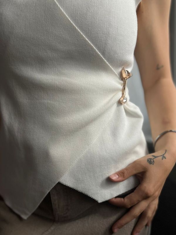 Top met goud detail
