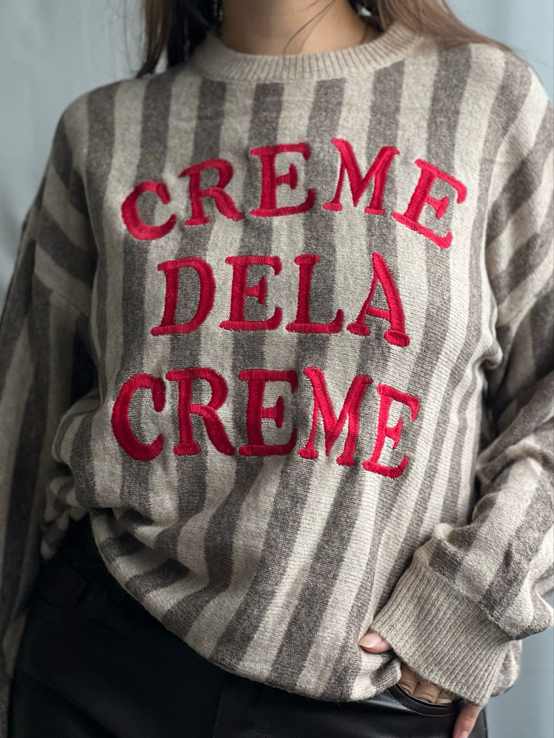 Gestreepte creme dela creme trui