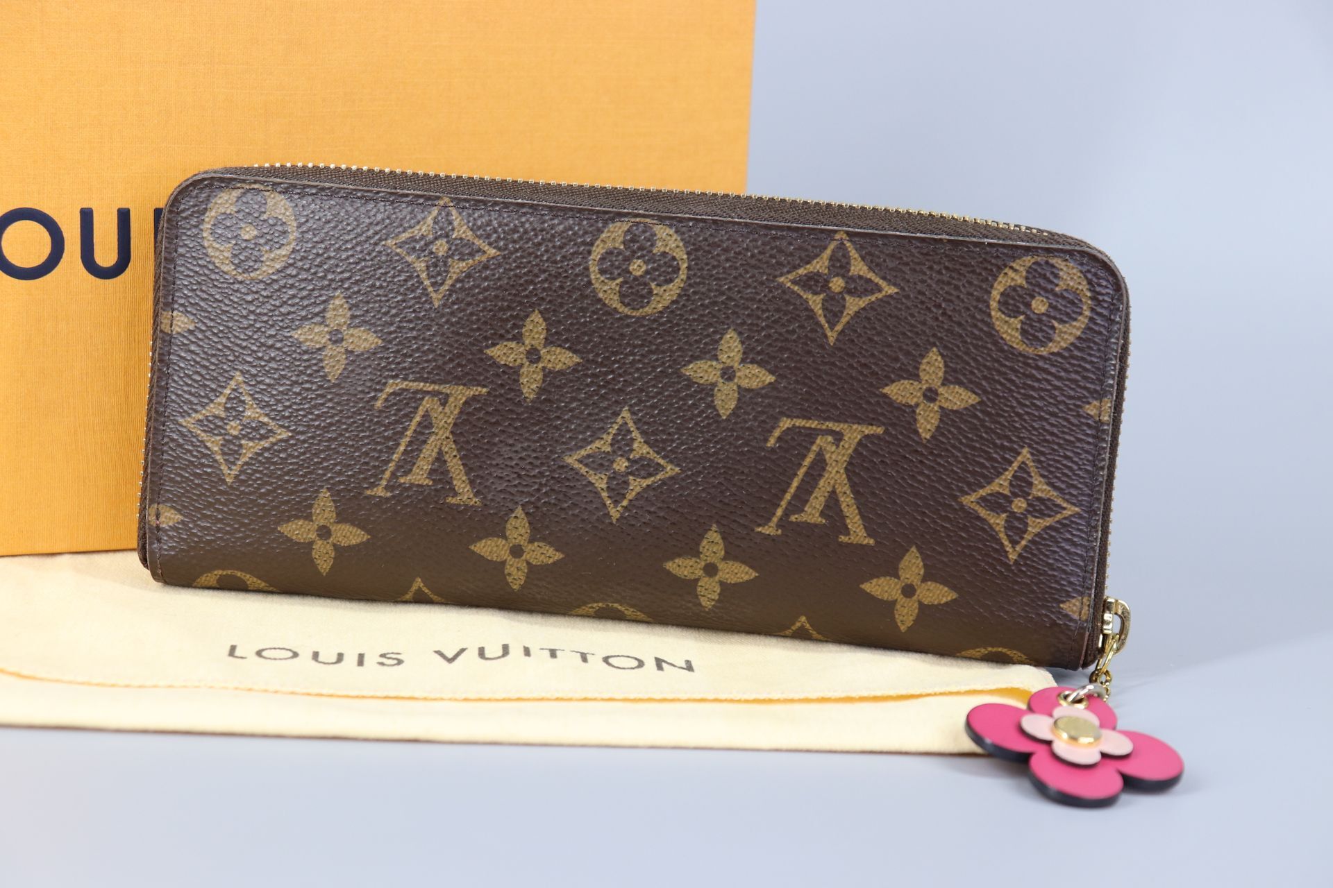 This Louis Vuitton Monogram Canvas Clemence Wallet isn't all about