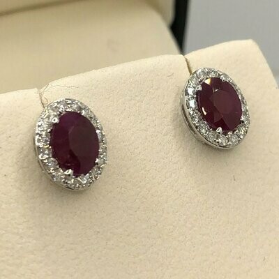 18ct white gold oval ruby and diamond stud earrings