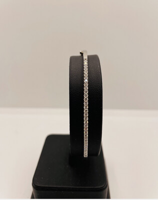 14ct White Gold Diamond Bangle. The Diamonds Are On One Side.
