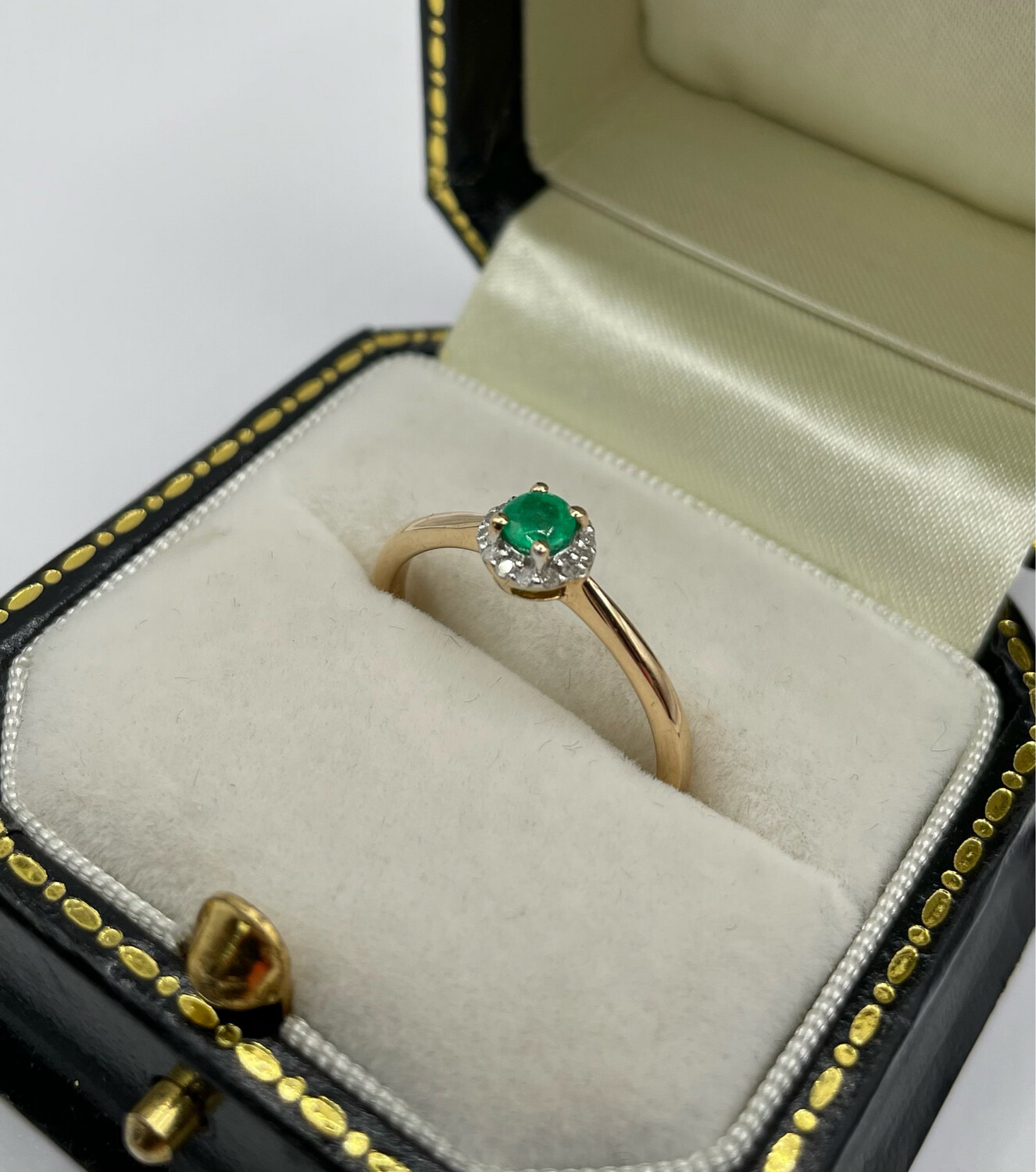 9ct Yellow Gold Emerald And Diamond Halo Ring.