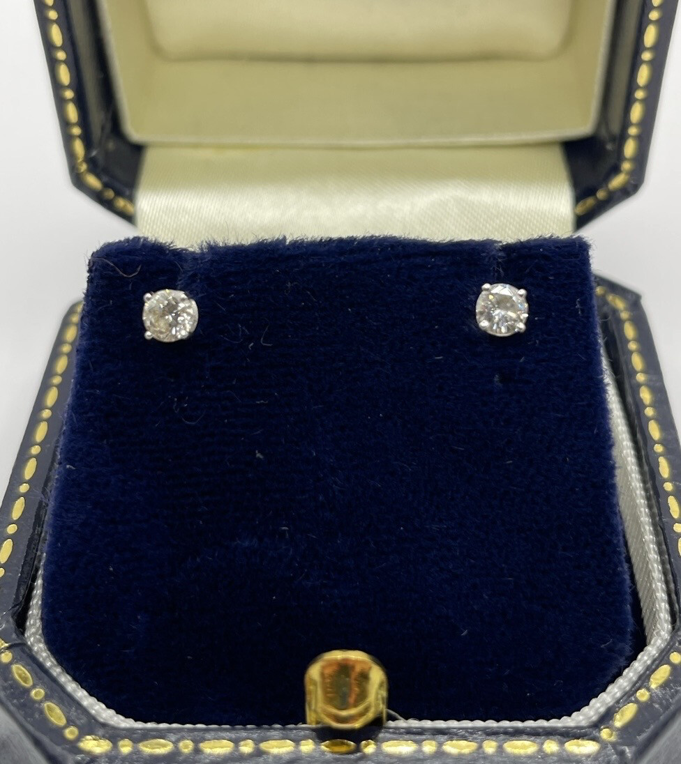18ct White Gold 0.30ct Diamond Stud Earrings In Four Claw Setting.