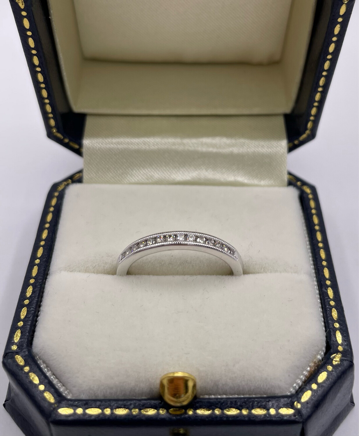 Diamond Half Eternity Ring On A Channel Setting In 18ct White Gold