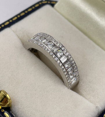 18ct White Gold Modern Band Ring With 1ct Of Baguette And Brilliant Cut Diamonds.