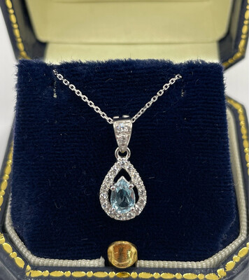 18ct Gold Pear Shape Aquamarine And Diamond Pendant.