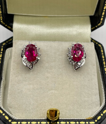 18ct White Gold Earrings With 1.80ct Of Rubies & Baguette & Brilliant Cut Diamonds.