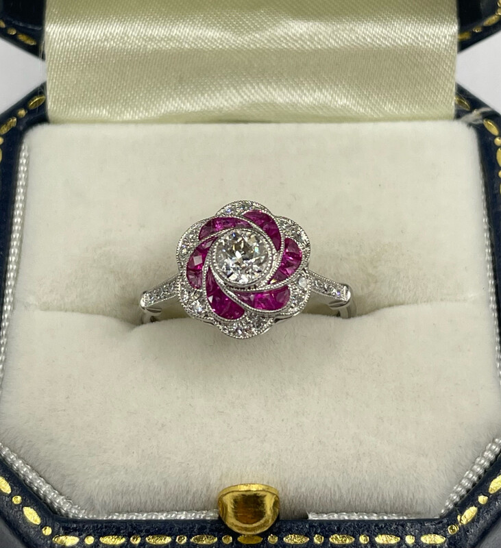 Beautiful Ruby And Diamond Platinum Rose Ring With Diamond Shoulders