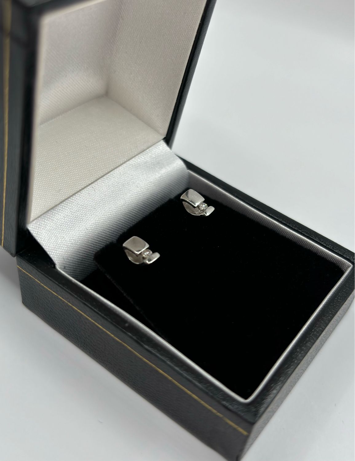 9ct White Gold Stud Earrings Each With Small Single Brilliant Cut Diamond