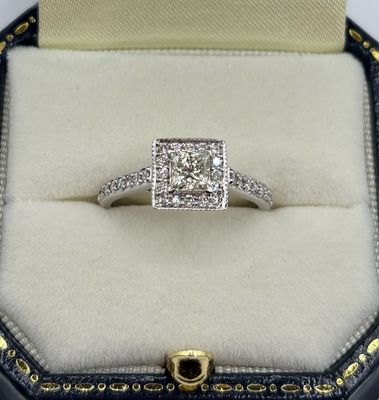 18ct .52ct Princess Cut Diamond Ring With A Halo Of .36ct Diamonds & Diamond Shoulders.