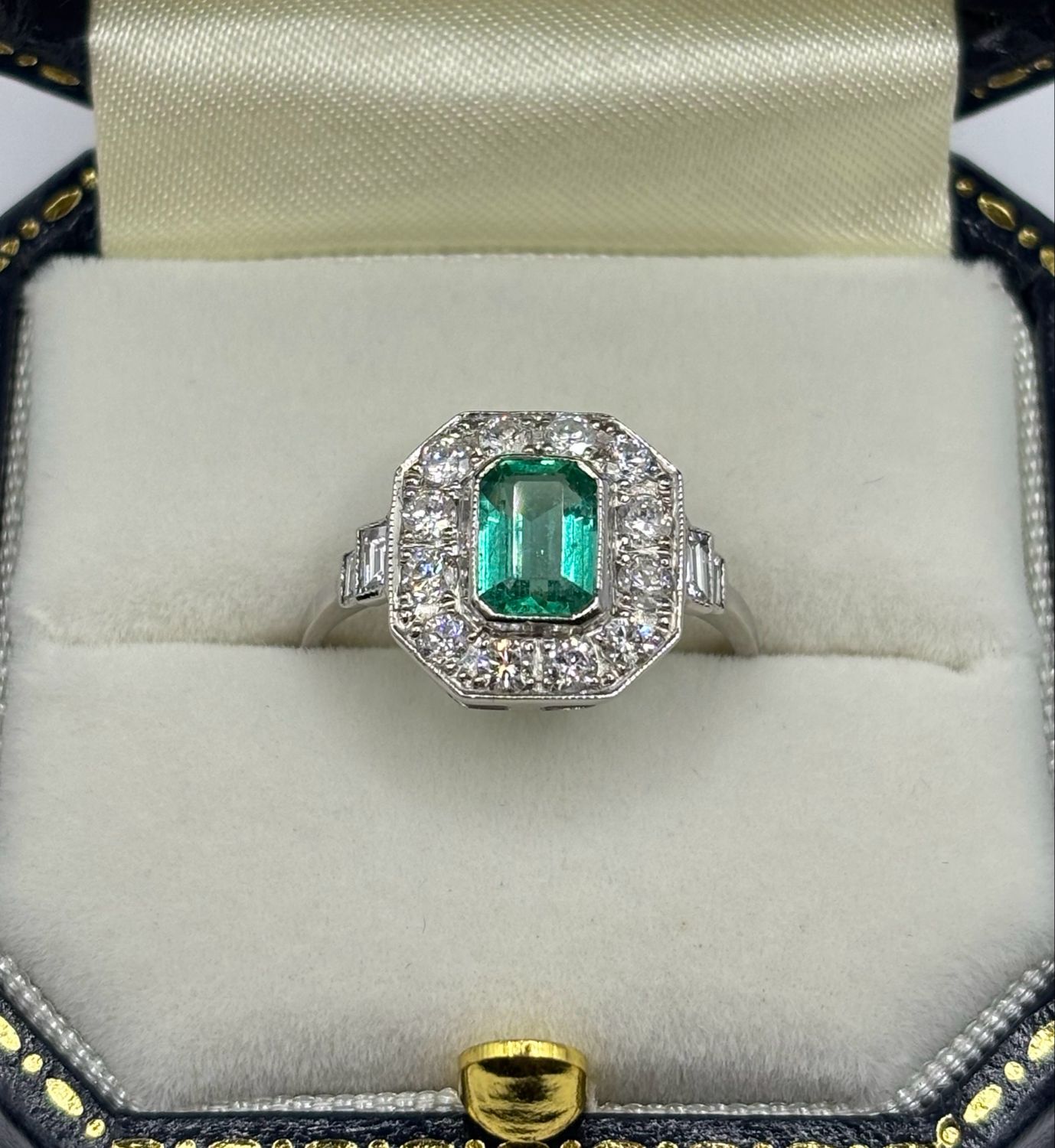 Platinum 1ct Emerald And .70ct Diamond Art deco Design Ring With Baguette Shoulders