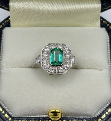 Platinum 1ct Emerald And .70ct Diamond Art deco Design Ring With Baguette Shoulders