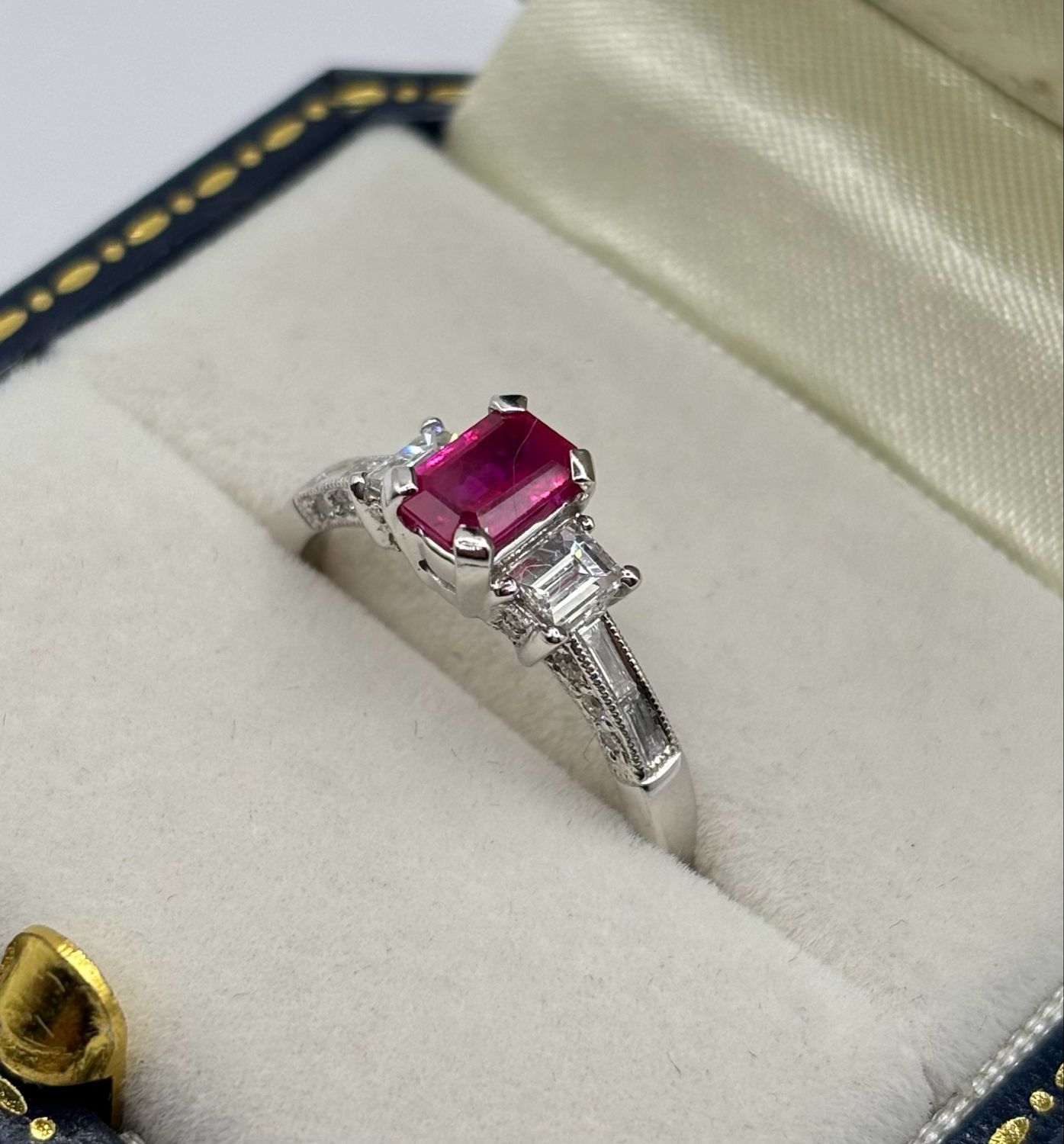 18ct White Gold Diamond Ring With .70ct Ruby And .50ct Emerald Cut/baguette Diamonds