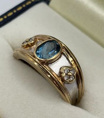 Pre-loved 9ct Yellow And White Gold Band Ring With Oval Blue Topaz And Diamonds
