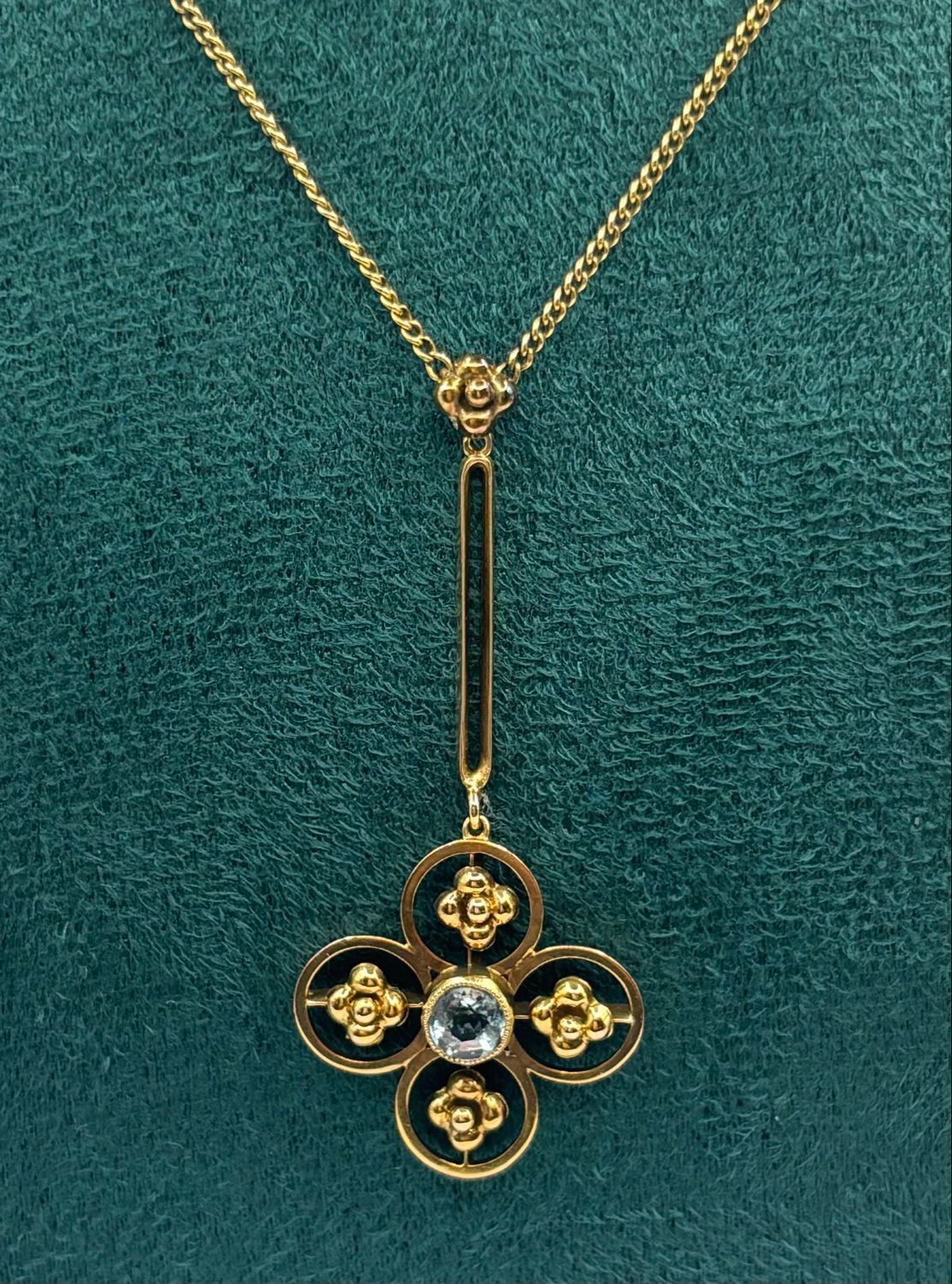Pretty Vintage 9ct Gold Pendant With Central Blue Topaz In A Foliage Design
