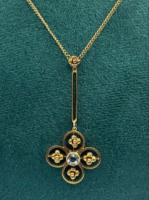 Pretty Vintage 9ct Gold Pendant With Central Blue Topaz In A Foliage Design