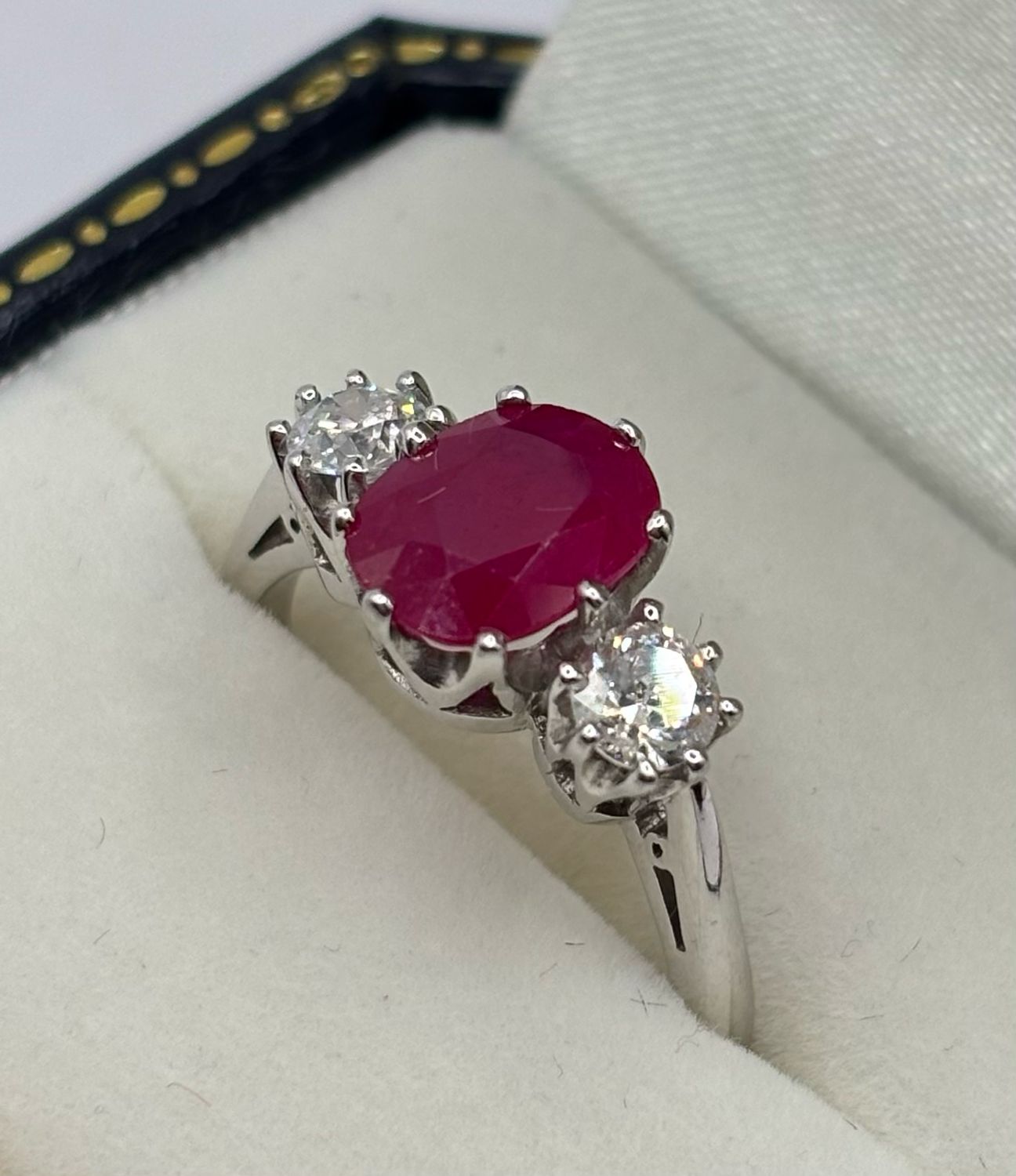 18ct White Gold 1.90ct Oval Ruby & .50ct Brilliant Cut Diamond Three Stone Ring