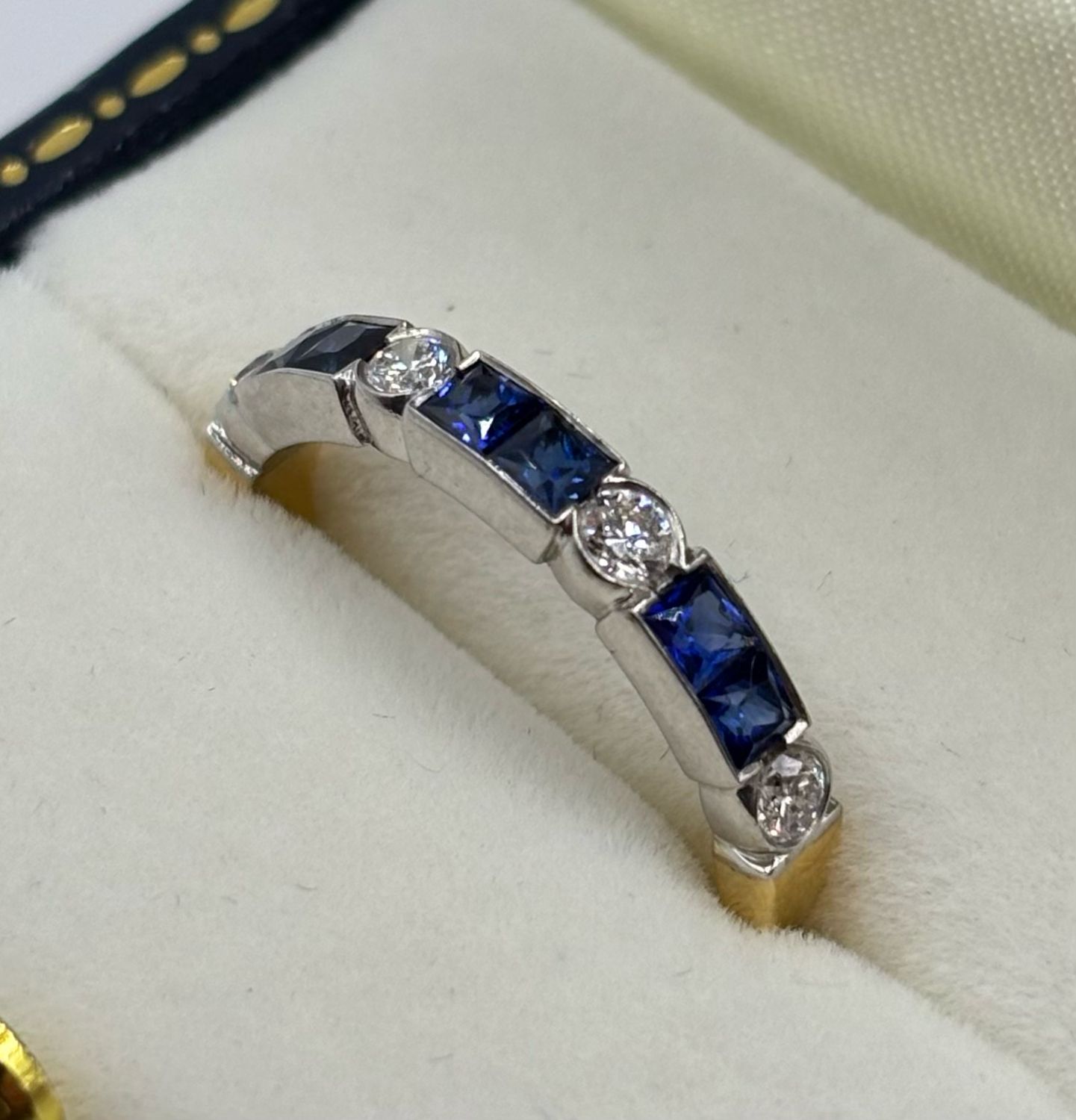 French Cut Sapphire 1/2 Eternity Ring With Four Round Brilliant Cut Diamonds In An 18ct White & Yellow Gold Band.
