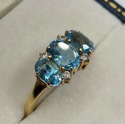 Vintage Blue Topaz And Diamond Three Stone Ring Set In 18ct Yellow Gold