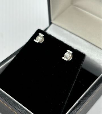 Preloved 9ct White Gold .25ct Diamond Studs In A Tension Setting