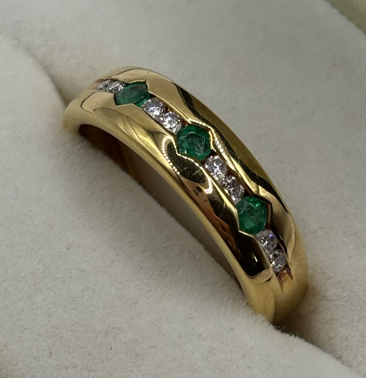 Vintage 18ct Yellow Gold Band Ring With Three Beautiful Emeralds And Six Brilliant Cut Diamonds.