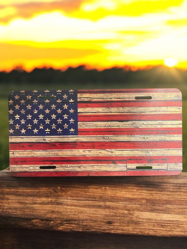 Aluminum Front License Plate Tattered Wood Grain American Flag