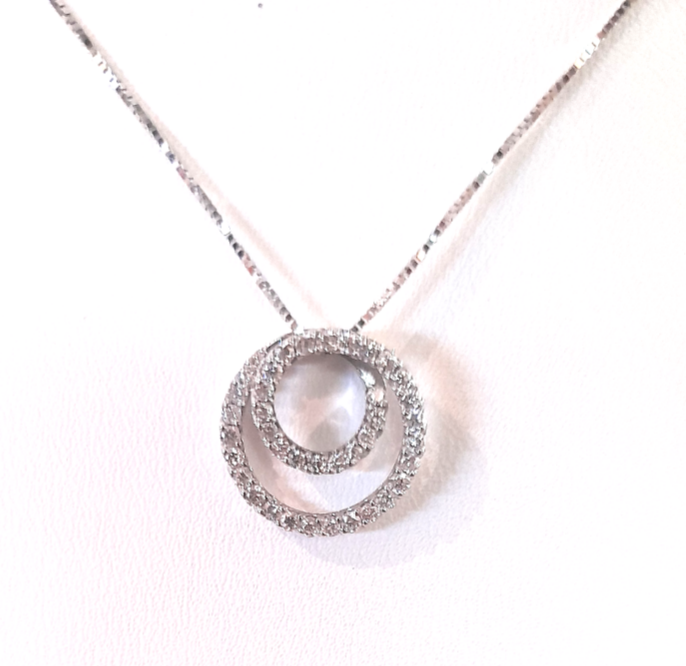 Collana con centrale a spirale di diamanti in oro bianco