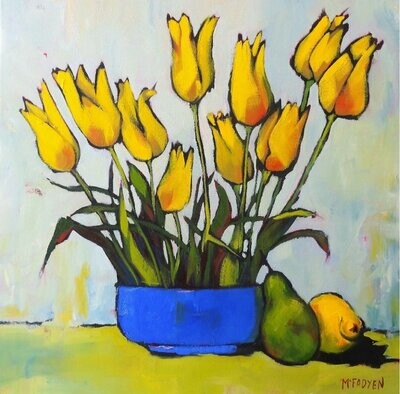 A Blue Bowl Of Yellow Tulips
