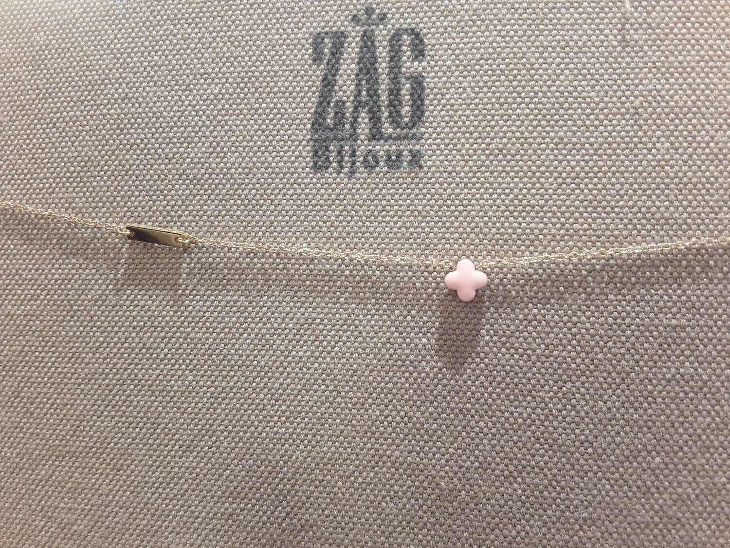 Collier sac bijoux  petit trèfle rose