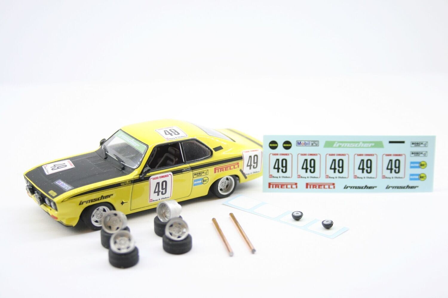 Prokit 1/43 bestehend aus 2 x 7 x13 +2 x  8 x 13 ATS mit 4 Reifen und 2 Achsen + Zusatzscheinwerfer + Decal für Opel Manta A Irmscher Spa 1975 -Fahrer W. Röhrl und R. Aaltonen
Ohne Modell !!!