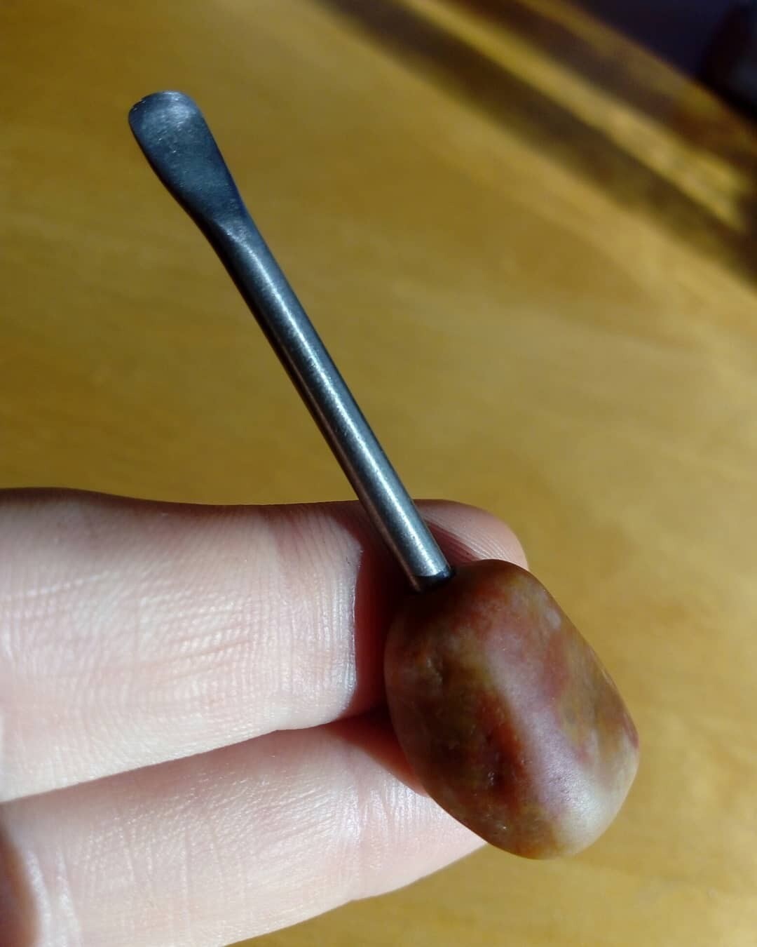 Carnelian gemstone handle with carbon steel tool.