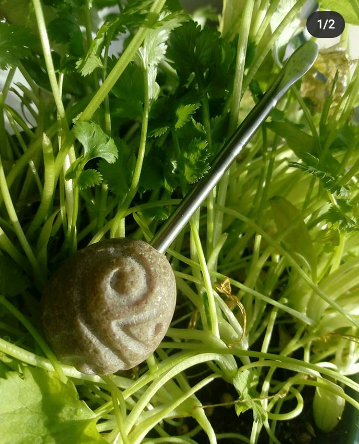 Irish granite handle with celtic motif and carbon steel tool.