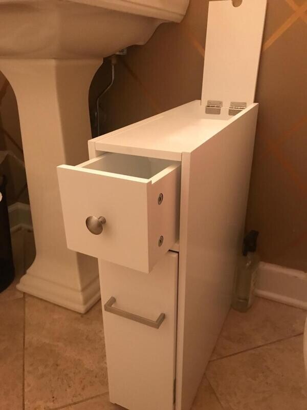 Space-Saving White Bathroom Cabinet with Toilet Paper Holder