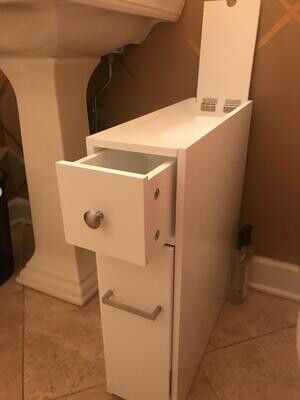 Space-Saving White Bathroom Cabinet with Toilet Paper Holder