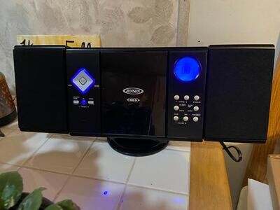 SonicVue Wall-Mountable CD System: Streamlined Digital AM/FM Stereo with Remote Control