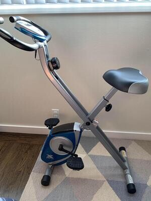 Compact and Efficient Folding Exercise Bike: Supports up to 225 LB Weight Capacity for Effective Fitness Workouts