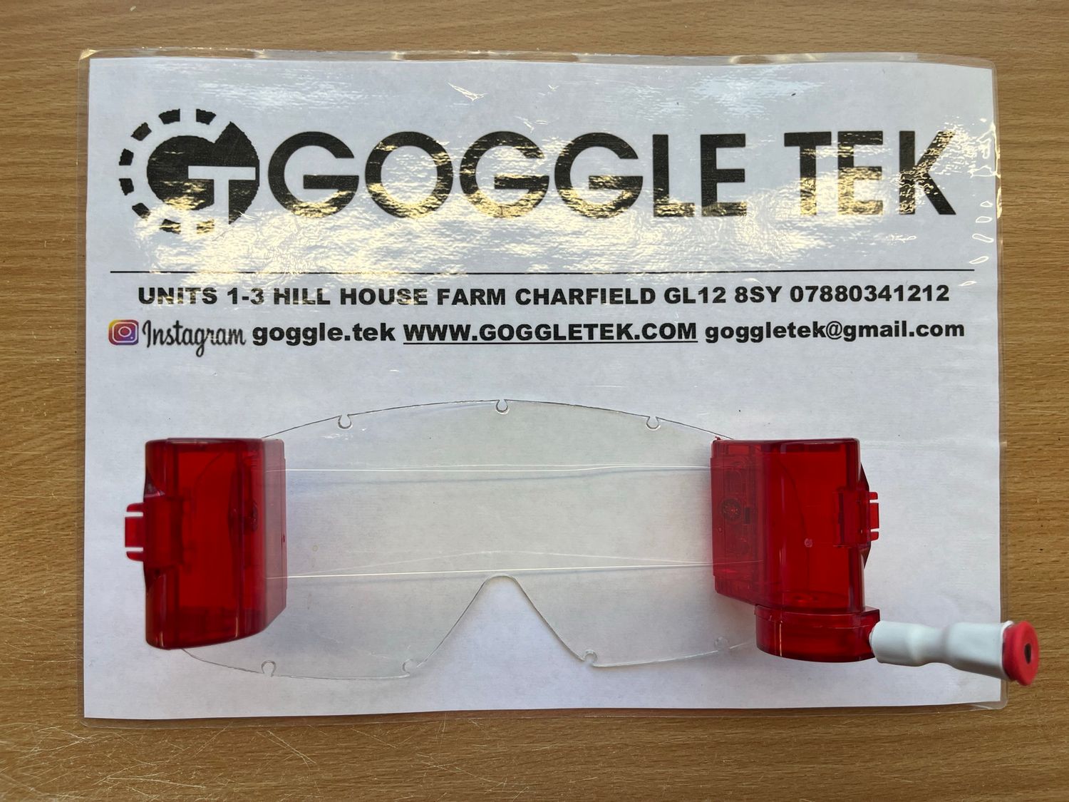 Red Oakley OFrame 36mm Long Pull roll-off system with fishing line, clear mudstrip & film (Clear lens)