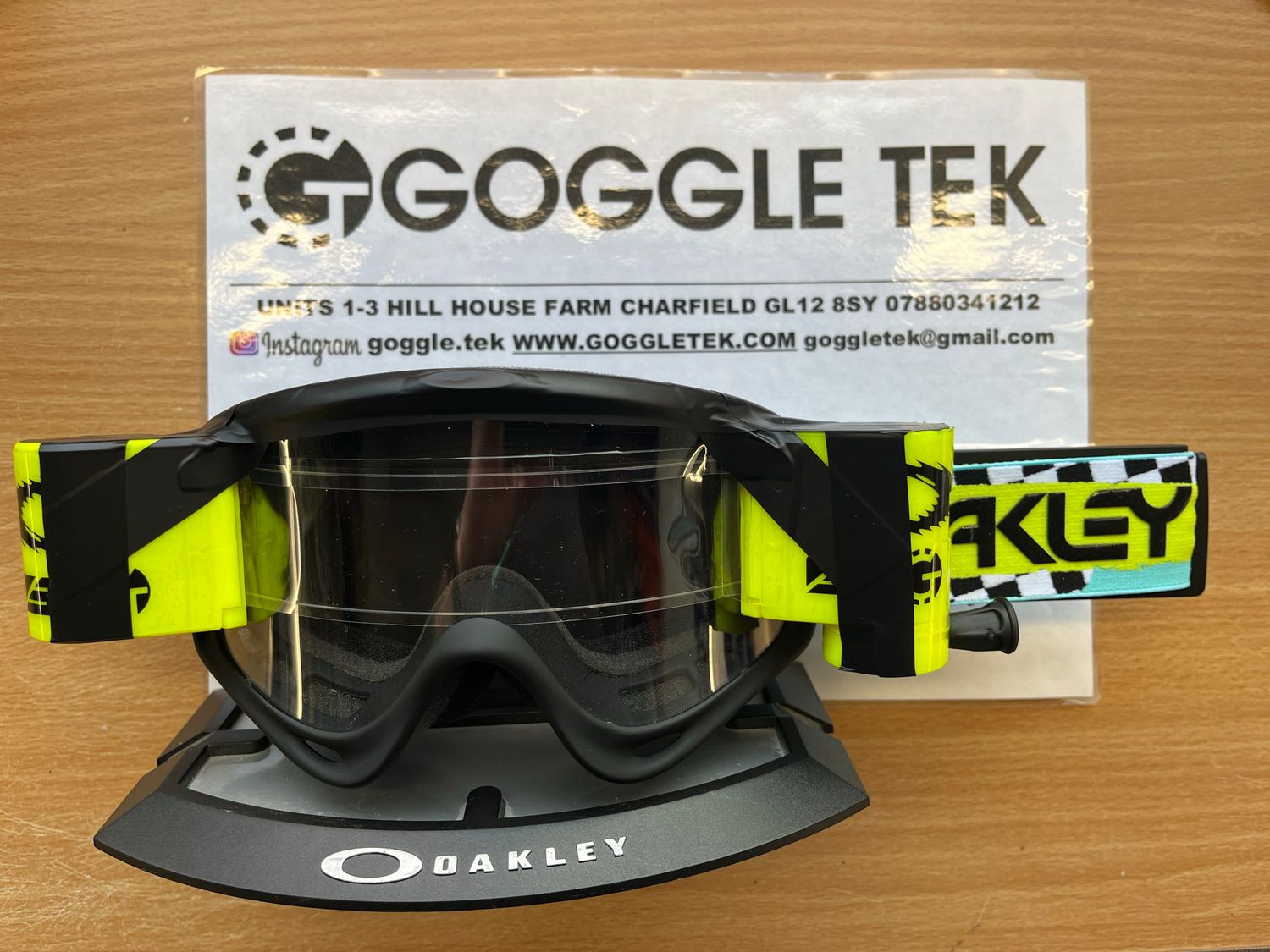 2025 Oakley Herlings Teal Checks OFrame goggle plus Flo Yellow Goggletek 36mm roll-off system (Clear lens)